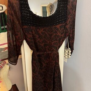 Vertigo Paris Black and Burgundy Long Sleeve Dress. Crocheted neckline
